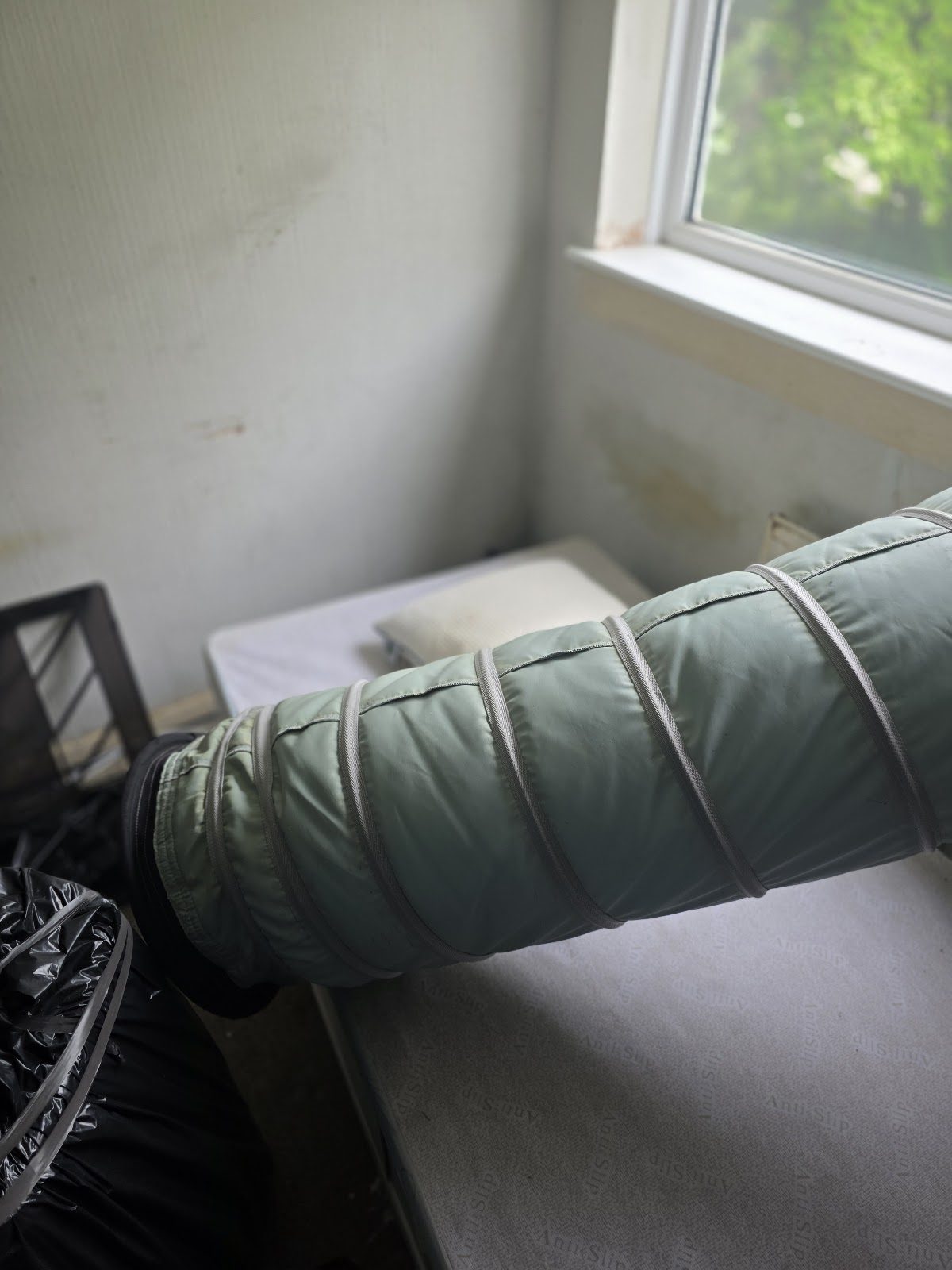 Heat treatment ducting reaching a bedroom during bed bug treatment